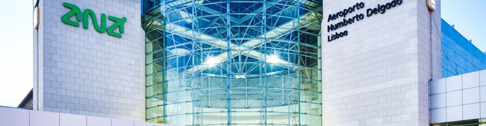 Runway view at sunset from Lisbon Portela Airport lounge